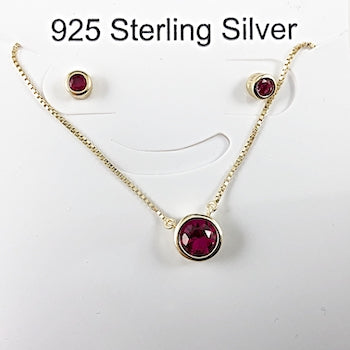 Elegant gold tone red bezel circle shape silver set