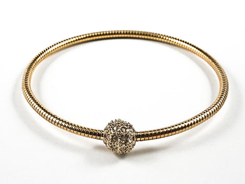 Nice Snake Texture Band With Center Crystal Ball Gold Tone Fashion Bangle