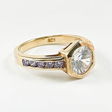 Elegant Solitaire Center Bezel CZ Purple Band CZ Gold Tone Silver Ring