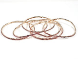 Nice 6 Piece Single Row Pink Crystal Gold Tone Stretch Fashion Bracelet