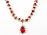 Fancy Elegant Pear Shape Dangle Design Ruby Color Crystal Gold Tone Fashion Earring Bracelet Necklace Set