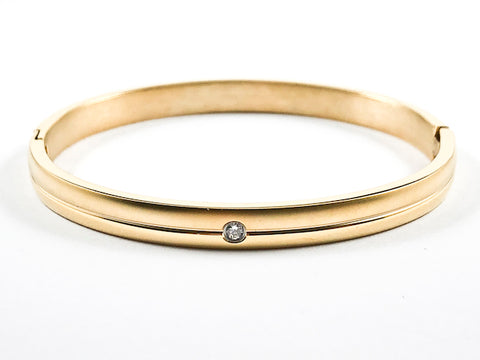 Simple Single Center CZ Gold Tone Steel Bangle