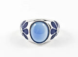 Beautiful Center Oval Blue Natural Style CZ With Floral Design Sides Silver Ring